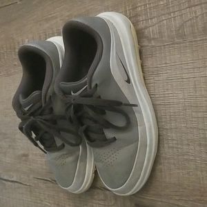 Boys Nike tennis shoe kleets